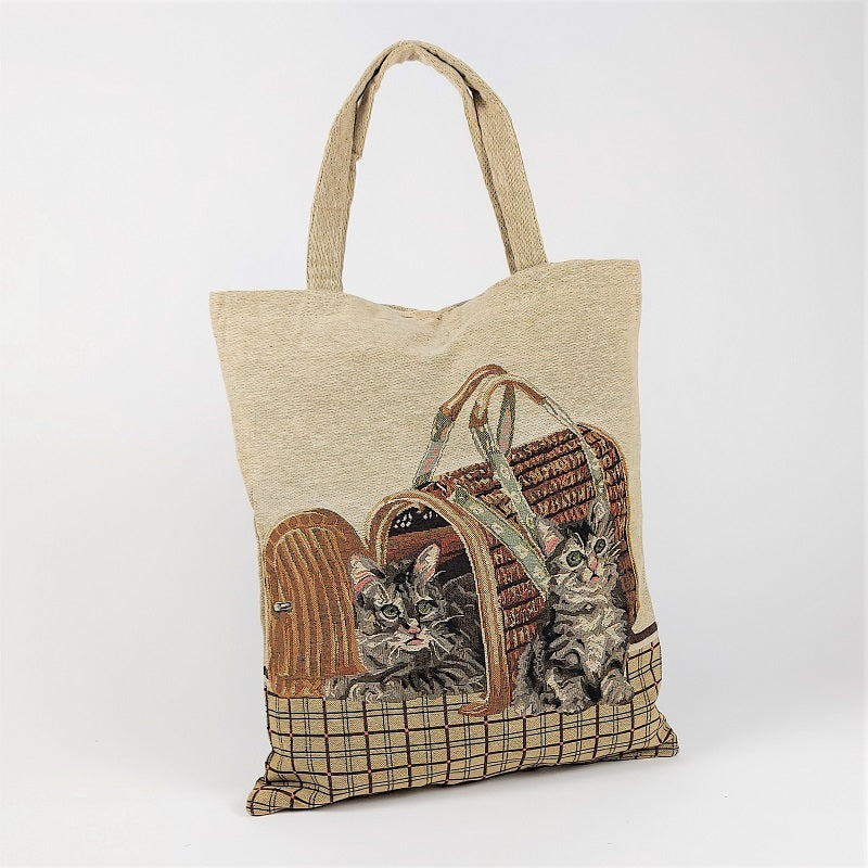 Gobelin bag with cats in a travel bench