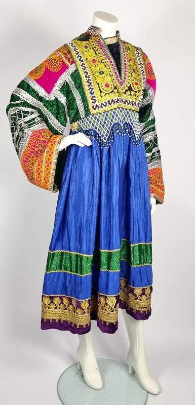 Antique Afghan dress, with traditional embroidery and tribal patches Woshoush Galerie & Trading Antique Afghan dress, with traditional embroidery and tribal patches Woshoush Galerie & Trading