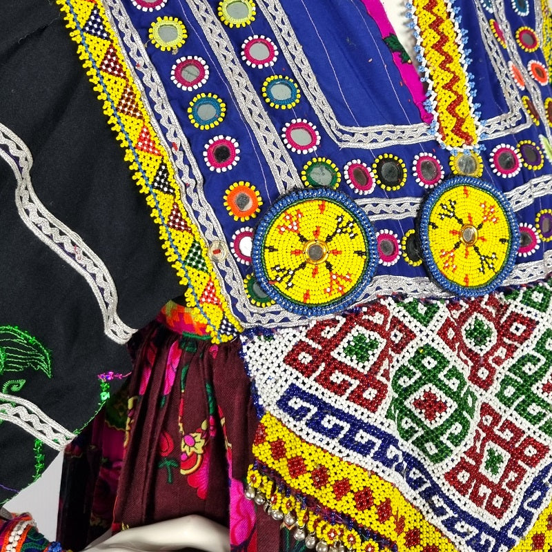 Antique Afghan dress, with traditional embroidery and tribal patches Woshoush Galerie & Trading Antique Afghan dress, with traditional embroidery and tribal patches Woshoush Galerie & Trading
